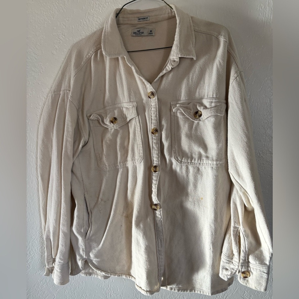 Hollister button down shirts 1 brown one and one cream one available size M